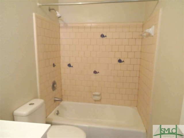 full bath with toilet,  shower combination, and vanity