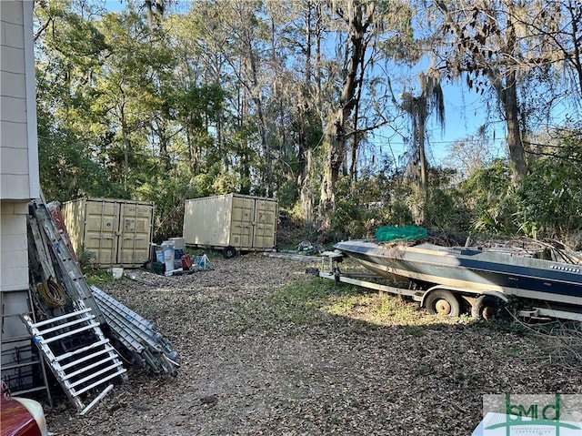 view of yard with mail area