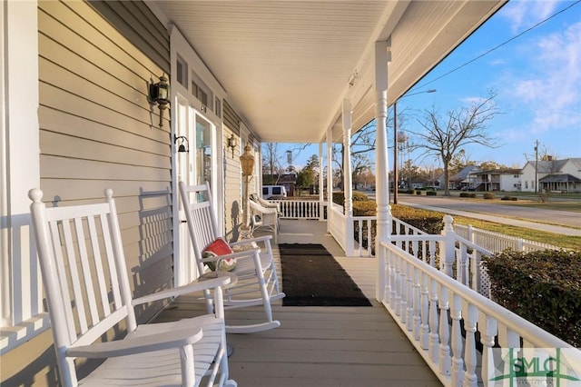 wooden terrace with covered porch