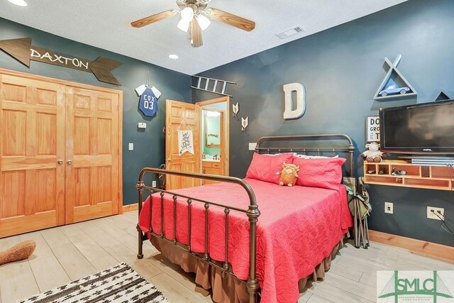 720 Old Dixie Hwy S, Springfield, GA 31329 - bedroom with a ceiling fan, wood finished floors, visible vents, and baseboards