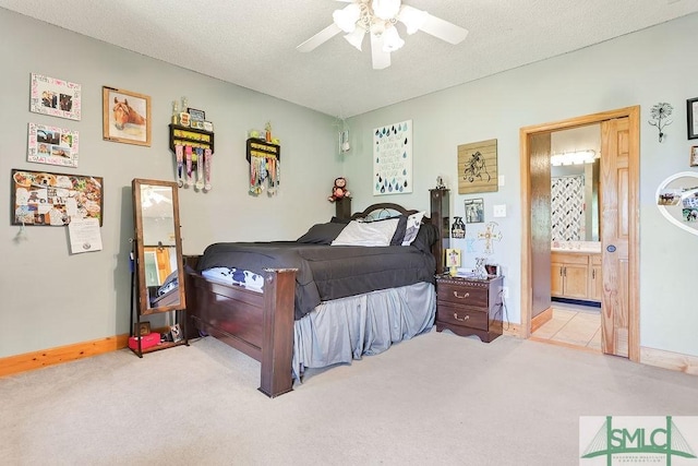 720 Old Dixie Hwy S, Springfield, GA 31329 - bedroom featuring a textured ceiling, carpet, and ensuite bathroom