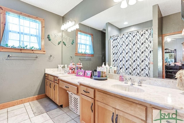 720 Old Dixie Hwy S, Springfield, GA 31329 - full bath featuring a textured ceiling, curtained shower, tile patterned flooring, a sink, and double vanity