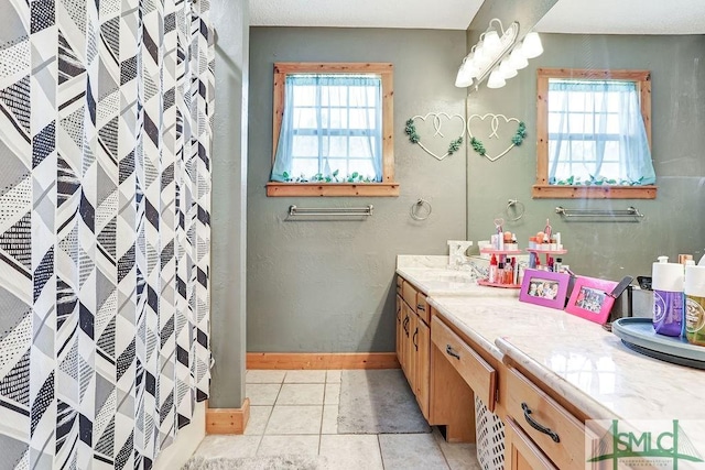 720 Old Dixie Hwy S, Springfield, GA 31329 - full bathroom featuring plenty of natural light, baseboards, tile patterned flooring, and vanity
