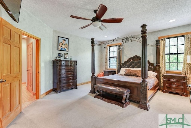 720 Old Dixie Hwy S, Springfield, GA 31329 - carpeted bedroom with a textured ceiling, a ceiling fan, and baseboards