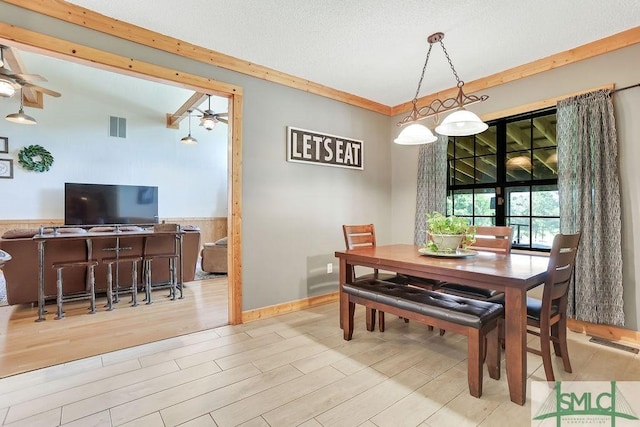 720 Old Dixie Hwy S, Springfield, GA 31329 - dining space featuring a ceiling fan, a textured ceiling, visible vents, and wood finished floors