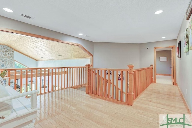 720 Old Dixie Hwy S, Springfield, GA 31329 - hallway featuring recessed lighting, visible vents, an upstairs landing, and wood finished floors