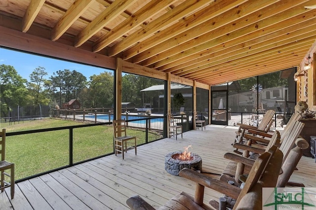 720 Old Dixie Hwy S, Springfield, GA 31329 - deck with a fire pit, a yard, fence, and a fenced in pool