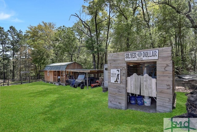 720 Old Dixie Hwy S, Springfield, GA 31329 - surrounding community with a carport, a yard, and an outdoor structure