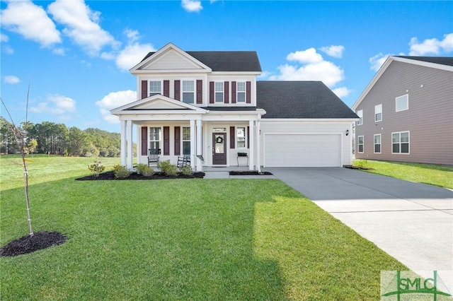 view of front facade featuring an attached garage, covered porch, driveway, and a front lawn