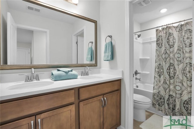 bathroom with shower / bath combination with curtain, visible vents, a sink, and double vanity