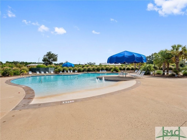 pool with a patio