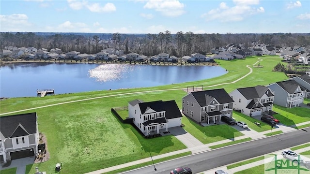 aerial view with a water view and a residential view