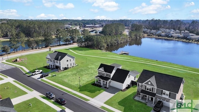 aerial view with a water view and a residential view