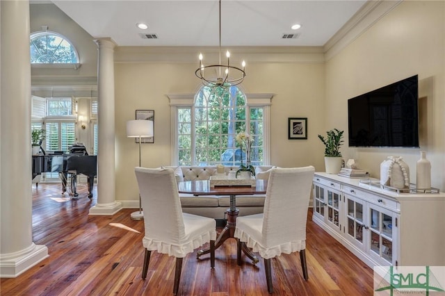 dining room with visible vents and ornate columns