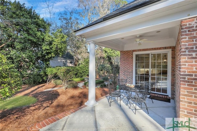 view of patio with ceiling fan and outdoor dining area