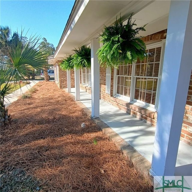 view of yard with a porch