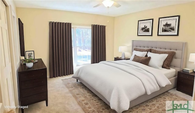 bedroom featuring a ceiling fan and light carpet