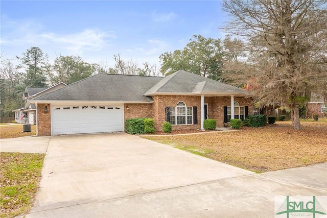 view of front of house with concrete driveway, brick siding, roof with shingles, and an attached garage