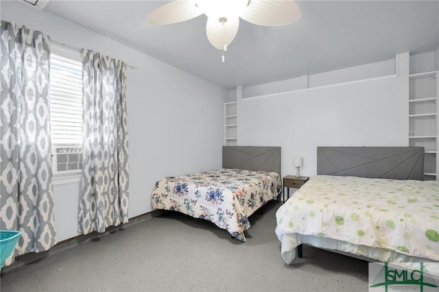 bedroom with ceiling fan and speckled floor