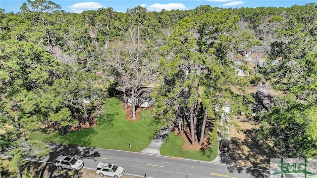 bird's eye view featuring a view of trees