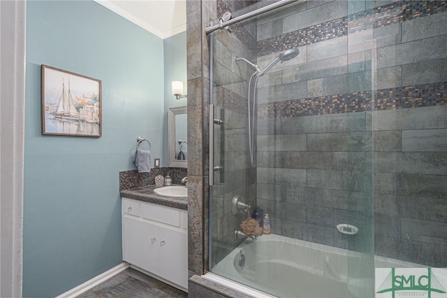 202 E 49th St, Savannah, GA 31405 - bathroom with tiled shower / bath combo, vanity, and ornamental molding