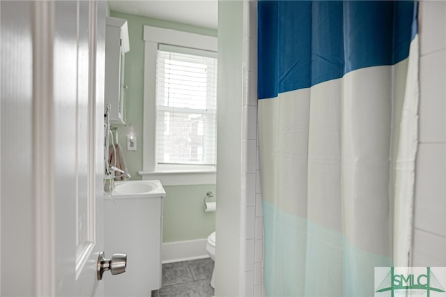 202 E 49th St, Savannah, GA 31405 - full bath featuring vanity, tile patterned flooring, and curtained shower