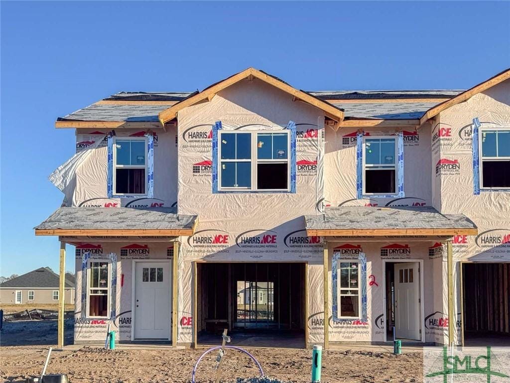 property under construction with stucco siding