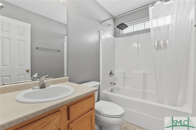 bathroom with vanity, toilet, and shower / bathtub combination with curtain