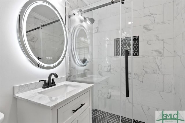 full bathroom featuring a shower stall and vanity