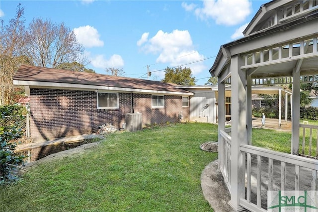 view of yard featuring central AC