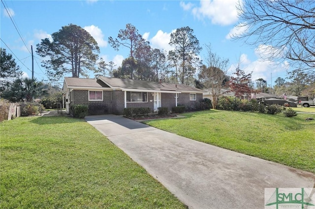 ranch-style house with concrete driveway, a front lawn, and brick siding