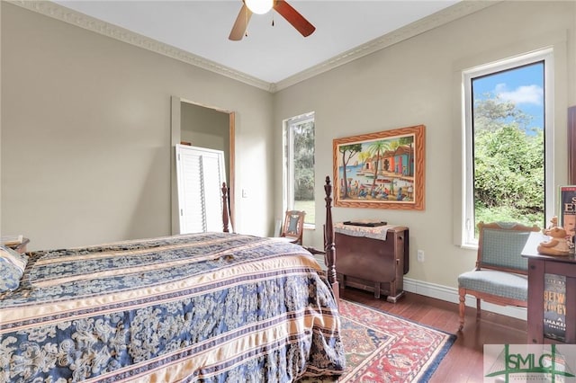 2132 Grove Point Rd, Savannah, GA 31419 - bedroom with hardwood / wood-style flooring, a ceiling fan, baseboards, and crown molding