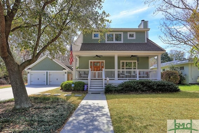 bungalow featuring a chimney, a porch, a shingled roof, a front yard, and ceiling fan