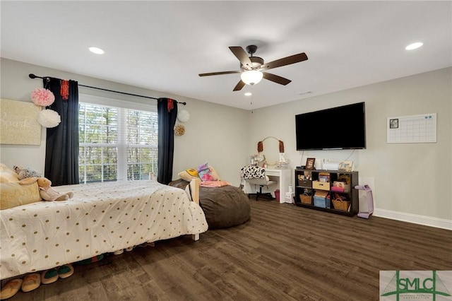 bedroom with dark wood-type flooring, recessed lighting, and baseboards