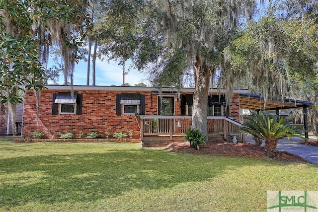 ranch-style house with brick siding and a front lawn