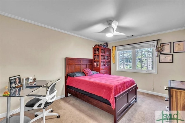 carpeted bedroom with ornamental molding, a ceiling fan, visible vents, and baseboards