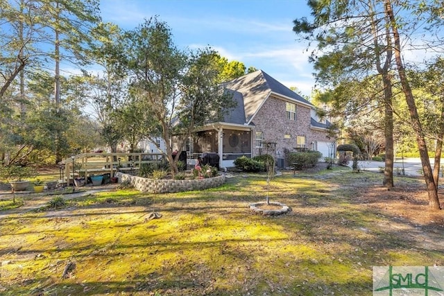 view of home's exterior featuring a sunroom