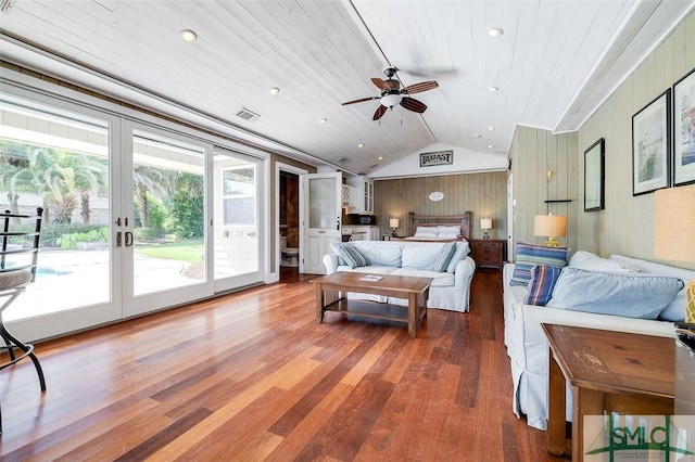 bedroom with visible vents, wood ceiling, wood finished floors, access to exterior, and vaulted ceiling