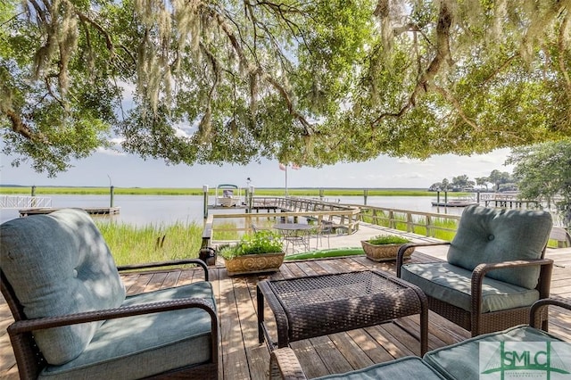 deck featuring a water view