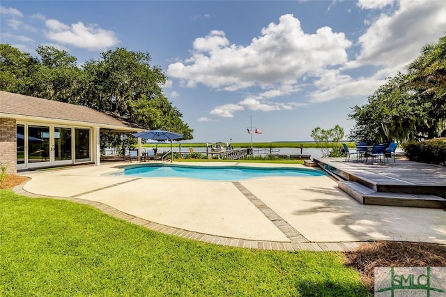 outdoor pool featuring a patio