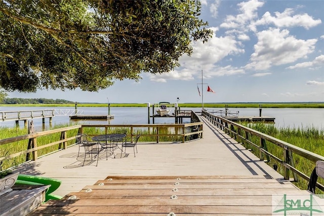 dock area featuring a water view and boat lift