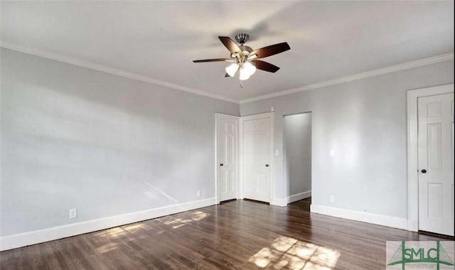 unfurnished bedroom with crown molding, wood finished floors, and baseboards