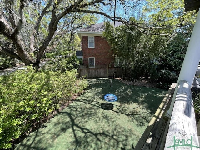 view of yard featuring fence