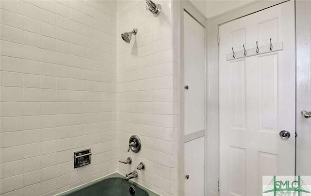 full bath featuring tub / shower combination