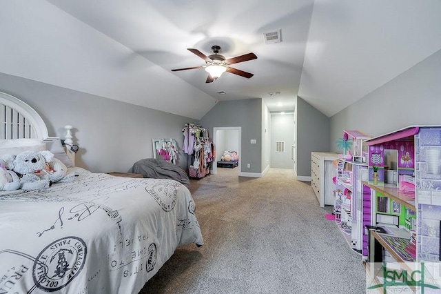 carpeted bedroom featuring vaulted ceiling, ceiling fan, visible vents, and baseboards