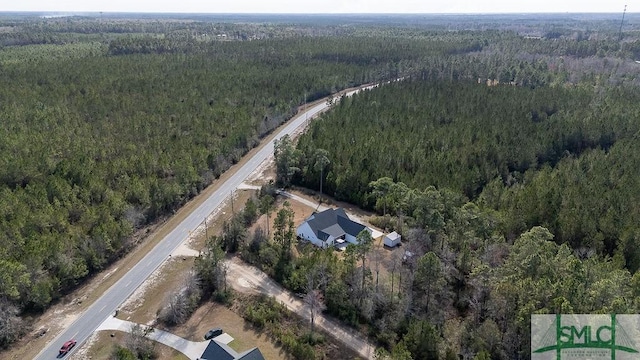 bird's eye view with a view of trees