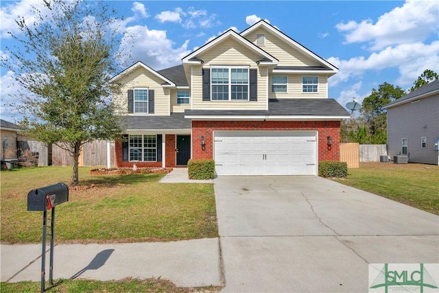 view of front of property with fence, a front lawn, concrete driveway, and brick siding