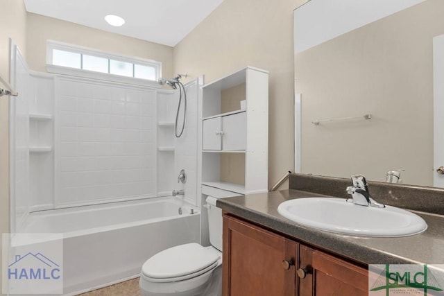 full bathroom with shower / washtub combination, vanity, and toilet