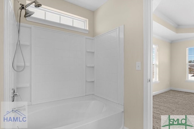 full bath featuring baseboards, bathtub / shower combination, and ornamental molding