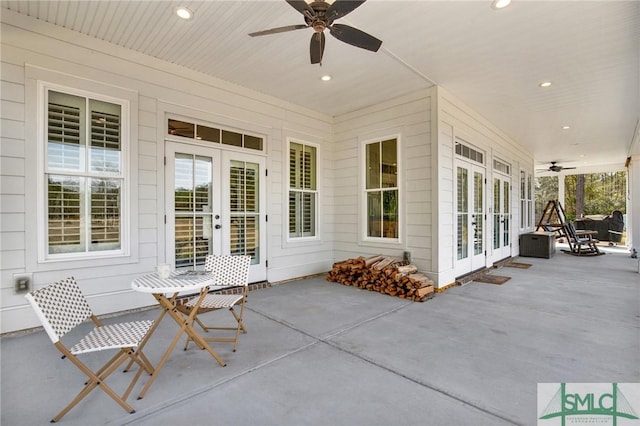 view of patio with ceiling fan and french doors